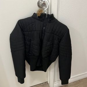 Black puffer jacket with fluffy, removable hood.
Like new
Size: XS-S